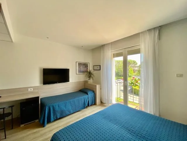 Camera Tripla — Hotel Garibaldi