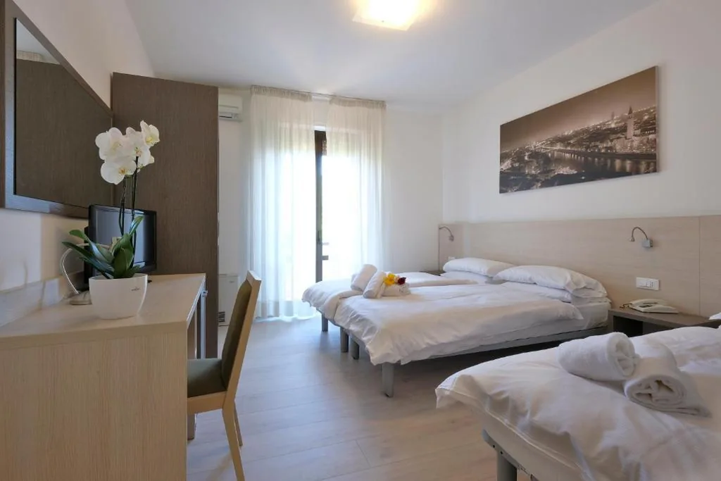 Triple Room — Hotel Gelmini