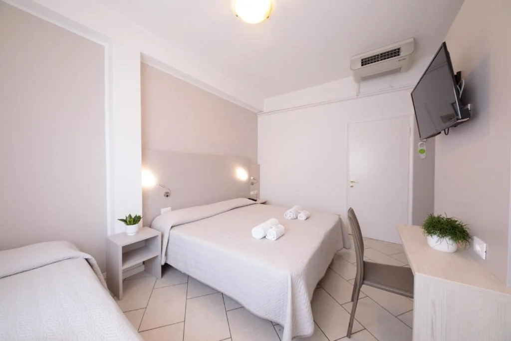 Triple Room — Hotel Madison