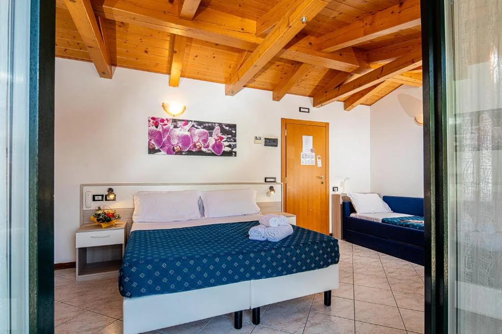 Triple Room — Hotel Orchidea