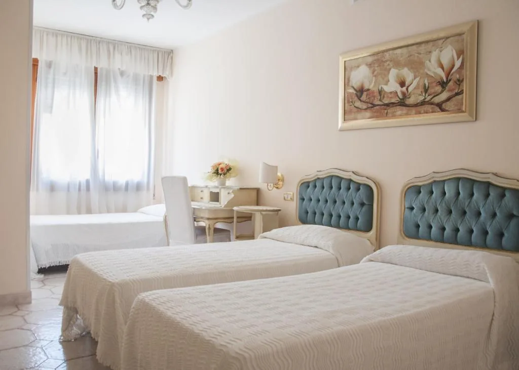 Triple Room — Hotel Villa Serena