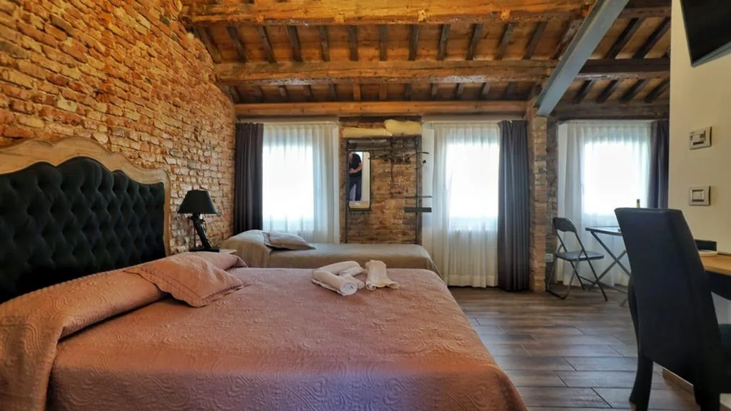 Camera Tripla Luxury — Barbara’s rooms
