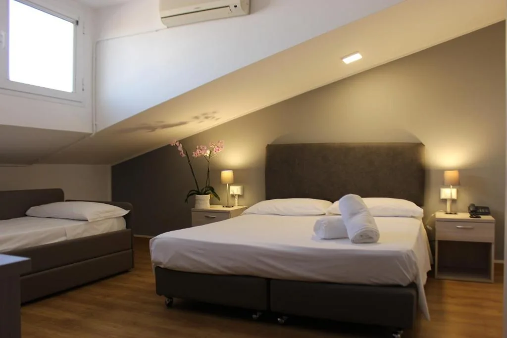 Triple Room - Attic — Hotel Loreley