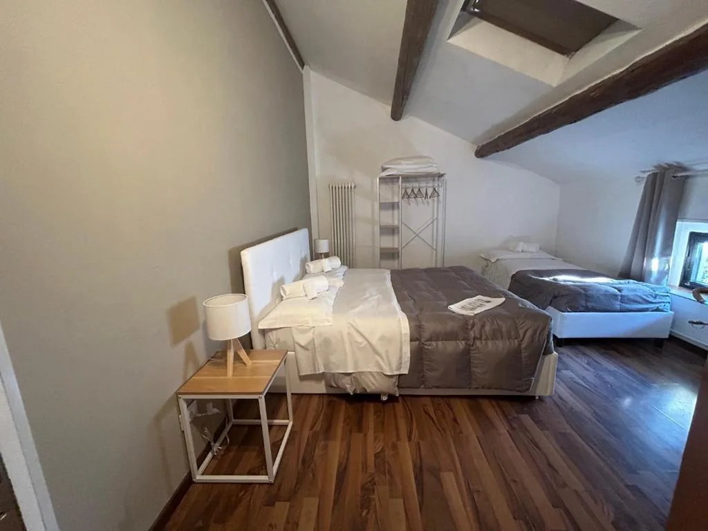Attic Triple Room with Shared Bathroom — La Magnolia – House
