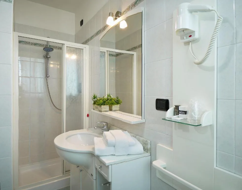 Standard Triple Room — ALA Hotel