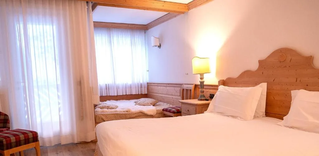 Camera Tripla Standard — Grifone Dolomiti Resort