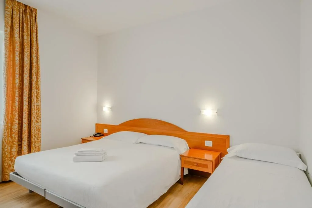 Standard Triple Room — Hotel Nuova Barcaccia