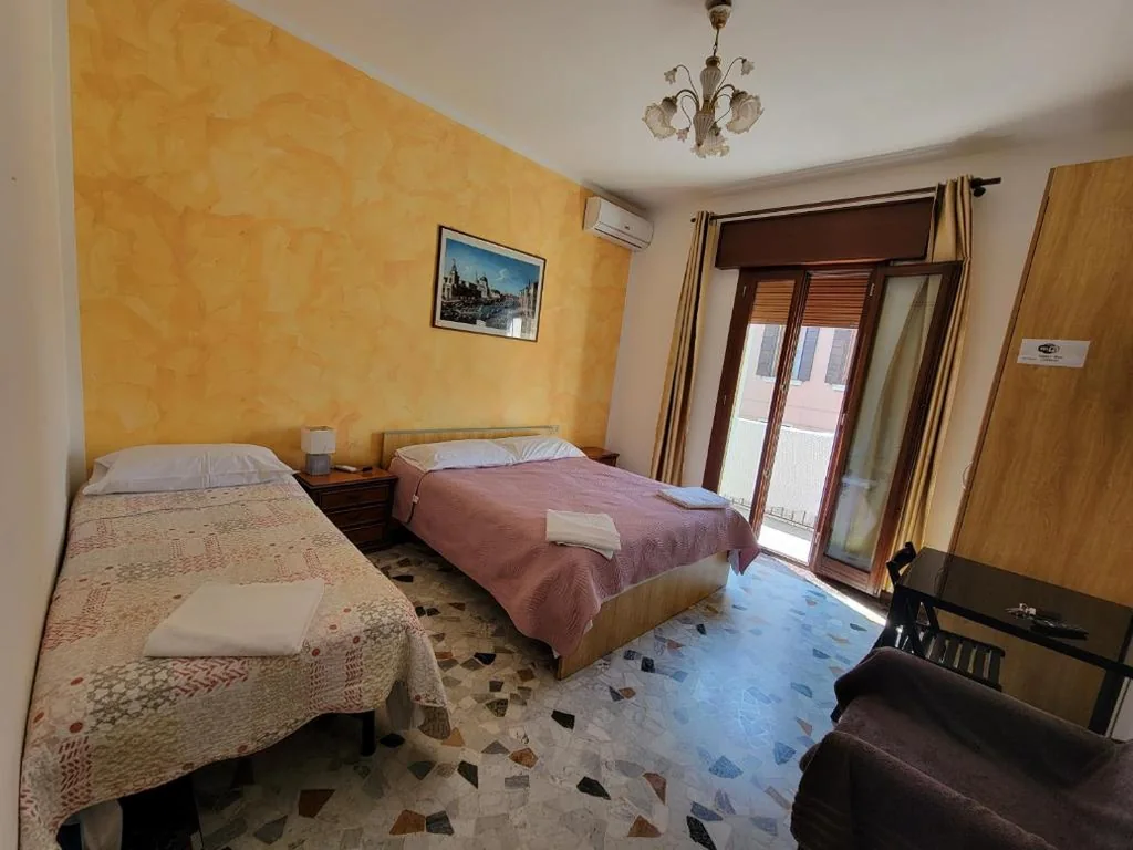Standard Triple Room — The Caponi Bros