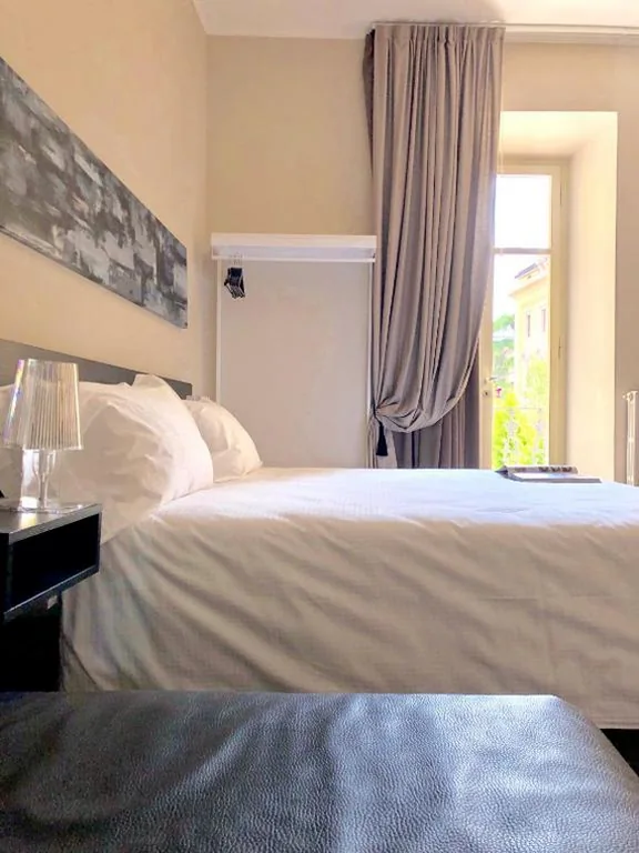 Superior Triple Room — Bue Nero Suites Verona
