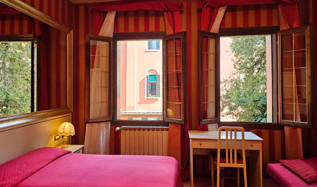Superior Triple Room with Garden View — Messner Palace