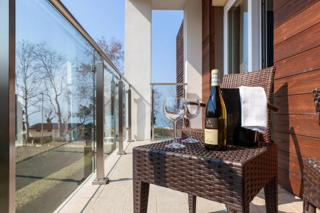 Superior Triple Room with Lake View — Hotel Maximilian