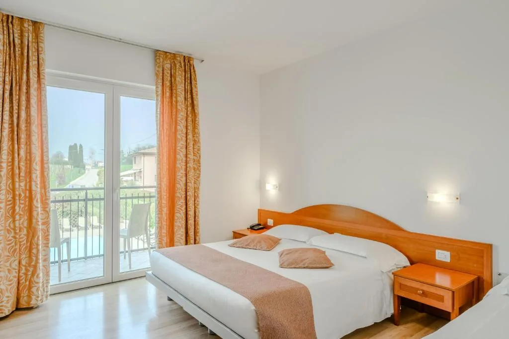 Superior Triple Room — Hotel Nuova Barcaccia
