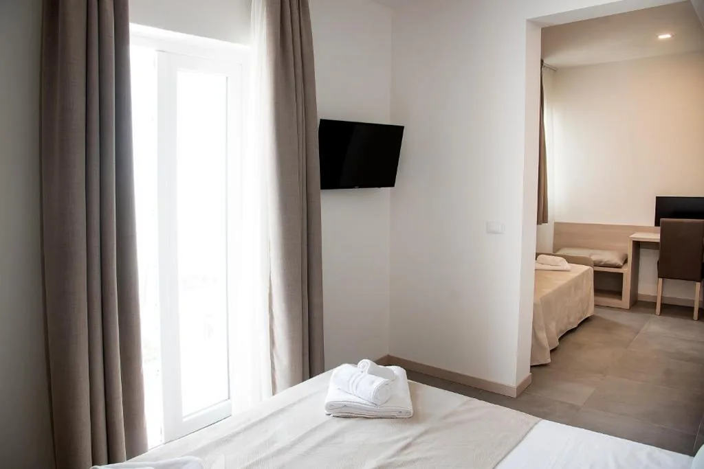 Deluxe Triple Room with Balcony and Partial Sea View — Hotel Solemare – Frontemare – 3 Stelle Superior