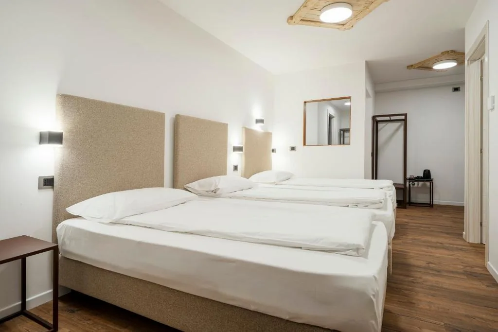 Family Room with Four Bedrooms and Four Bathrooms — Nord Hotel