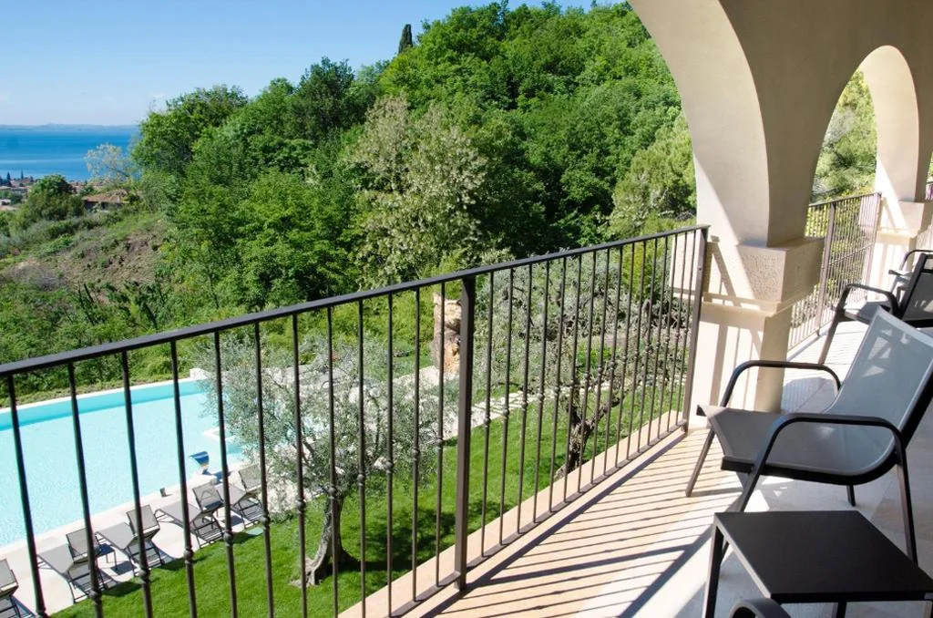 Junior Suite with Balcony and Lake View — Ca’ Barbini Resort