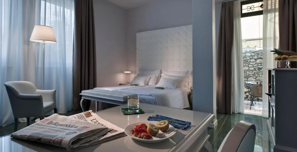 Junior Suite con Giardino — Palace Hotel San Pietro