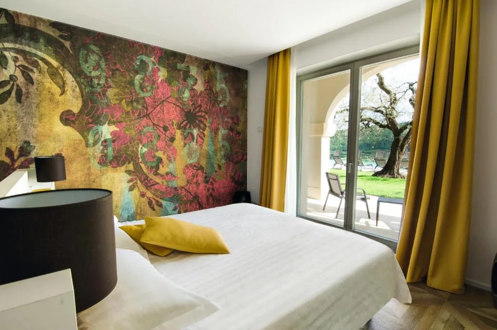 Junior Suite with Patio and Pool View - Ground Floor — Ca’ Barbini Resort