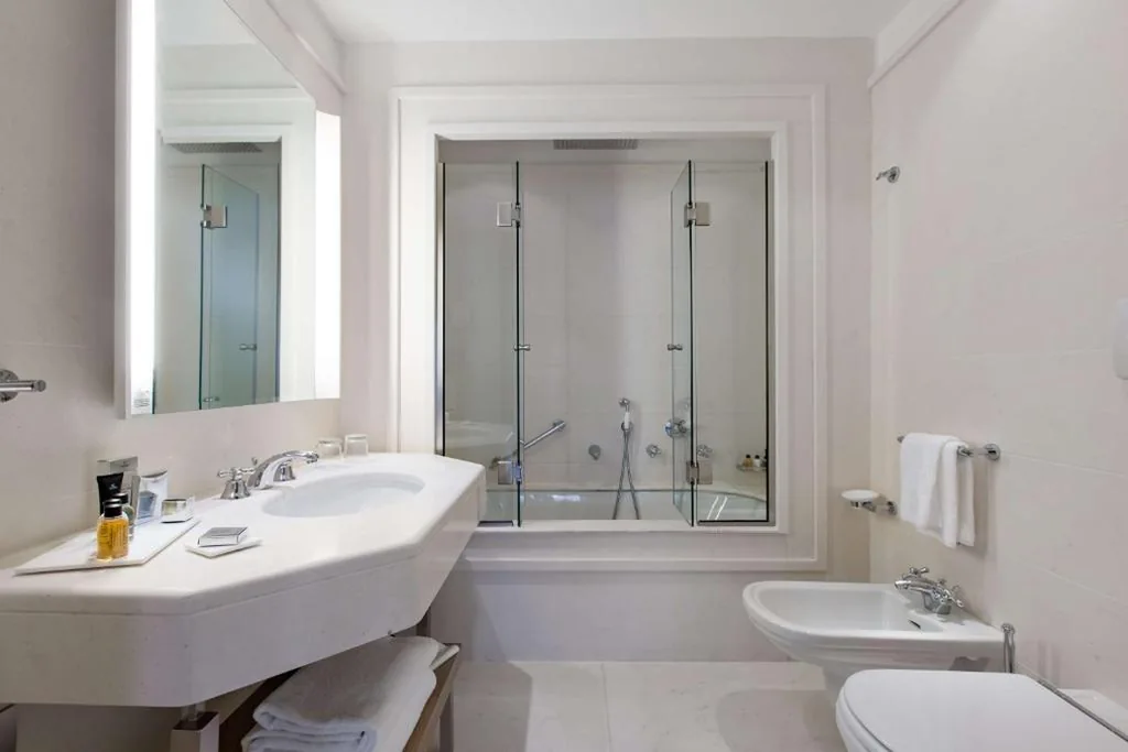 Junior Suite with Dolomite View — Grand Hotel Savoia Cortina d’Ampezzo, A Radisson Collection Hotel