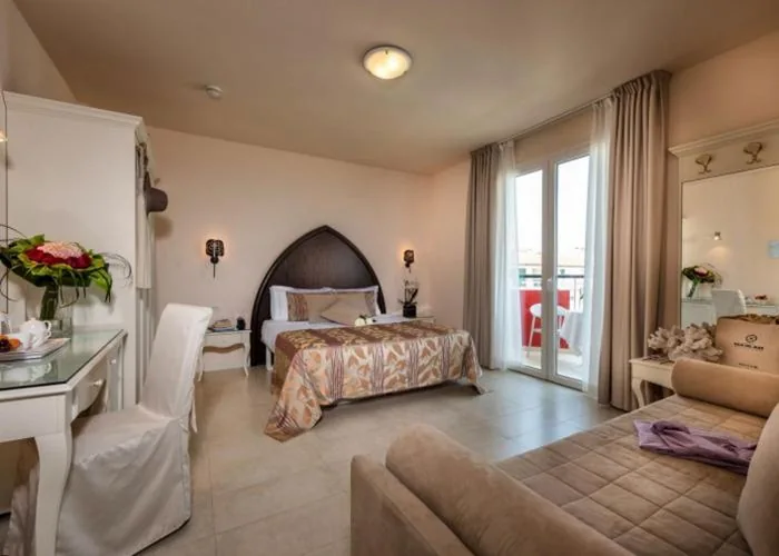 Junior Suite with Partial Sea View — Baia del Mar Beach Boutique Hotel