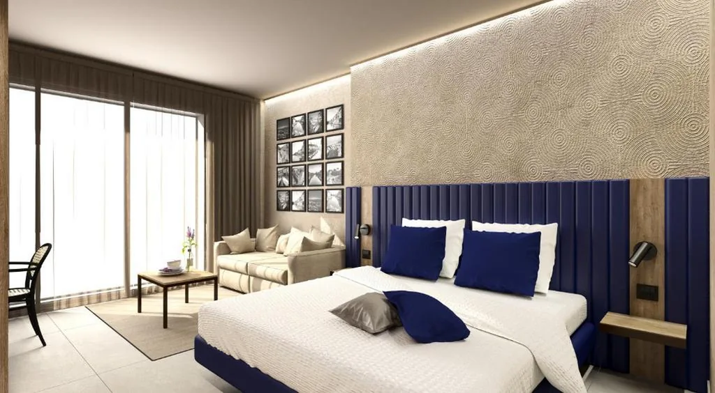 Junior Suite with Balcony and Partial Lake View - Separate Building — Nettuno Residence Hotel