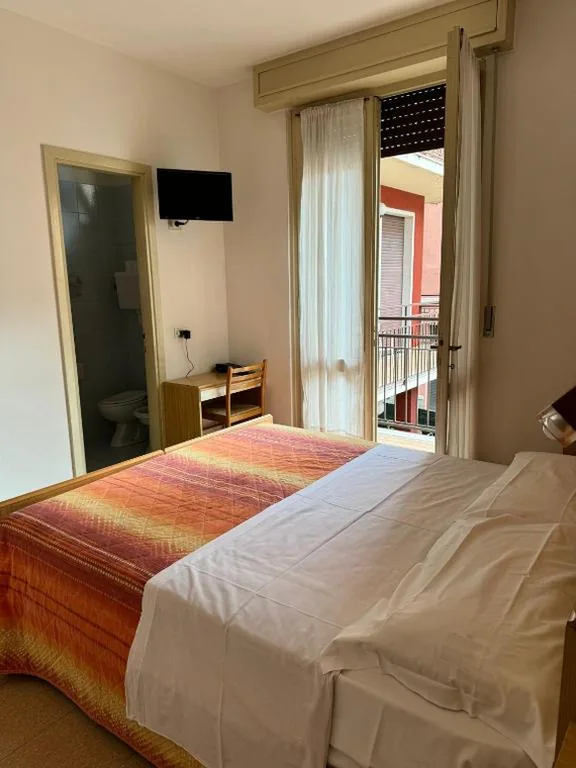 Piccola Camera Matrimoniale/Doppia con Letti Singoli — Hotel Garnì Capinera