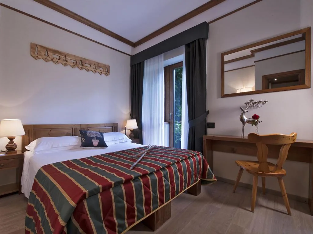 Suite (3 Adulti) — Boutique Hotel Villa Blu Cortina D’Ampezzo