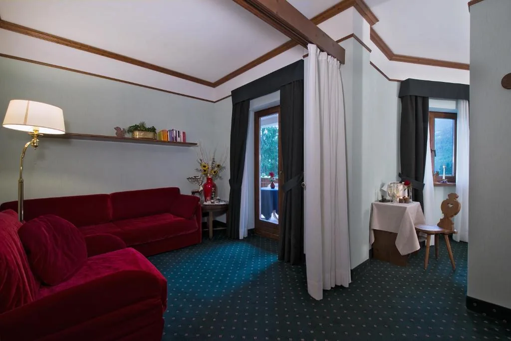 Suite (4 Adulti) — Boutique Hotel Villa Blu Cortina D’Ampezzo