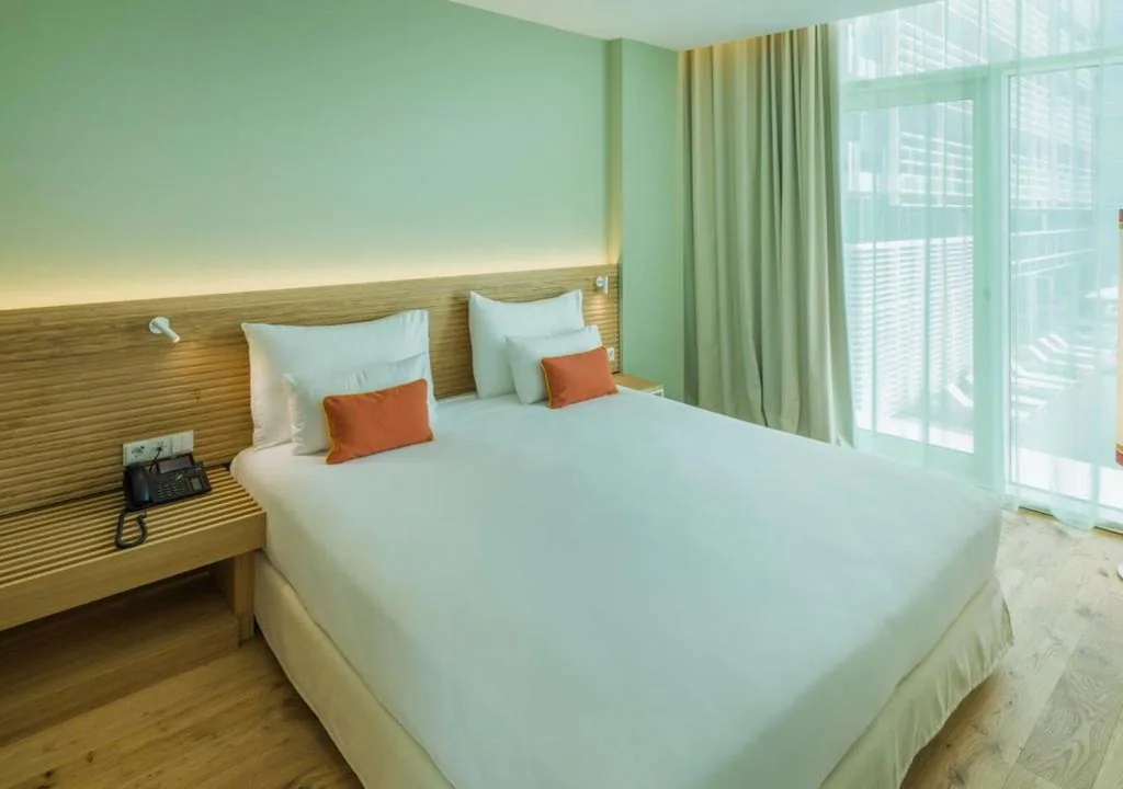 Suite with Balcony and Side Sea View — Falkensteiner Hotel & Spa Jesolo