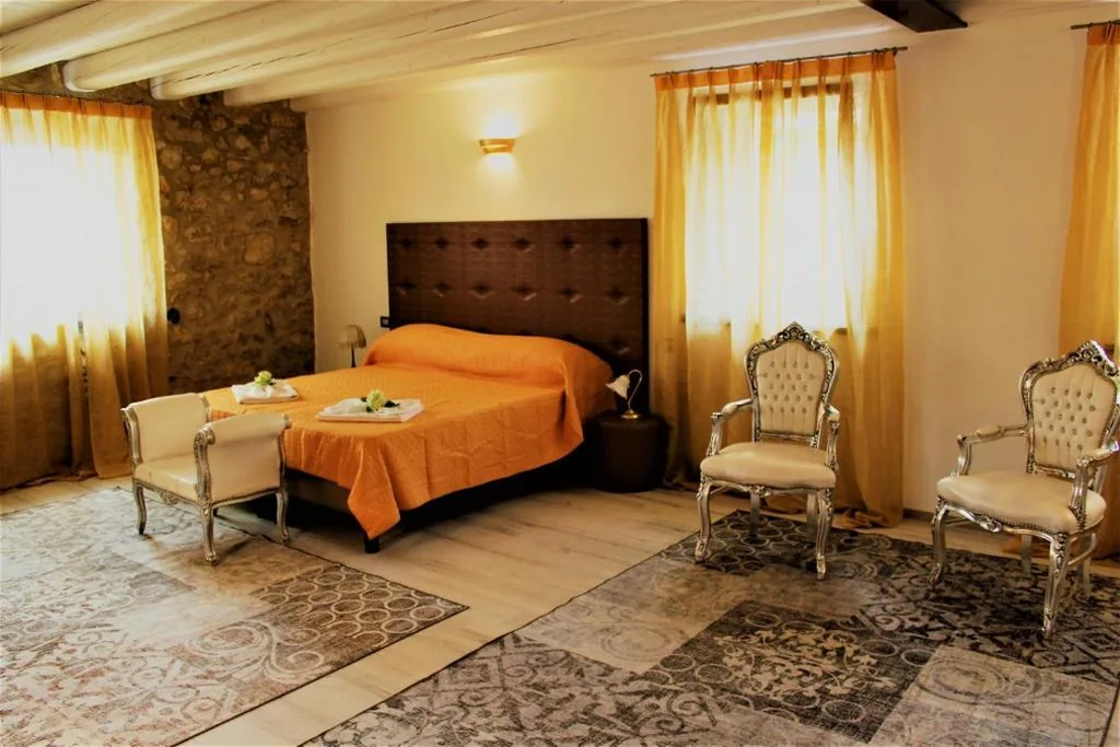Suite Deluxe — B&B Arco di Vino