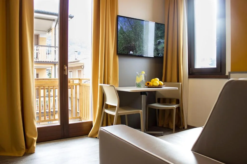Deluxe Suite with Balcony — Hotel Dolomiti