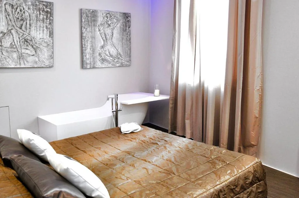 Suite King con Balcone — Le Camp Suite & Spa