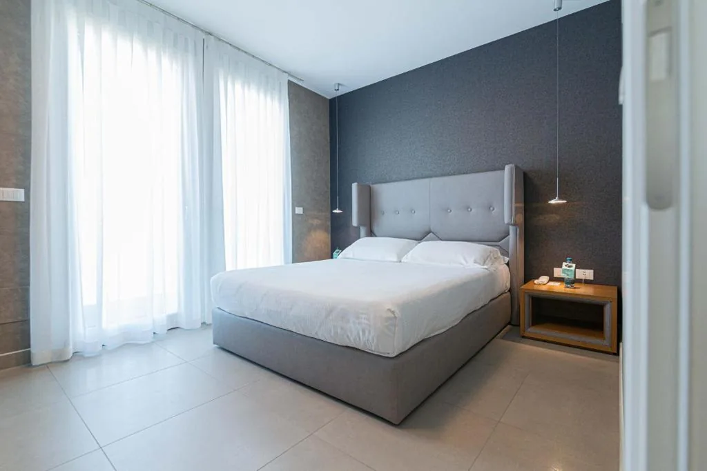 King Suite with Balcony, Lagoon View and Beach Access — Mosella Suite Hotel – A Lagoon Retreat