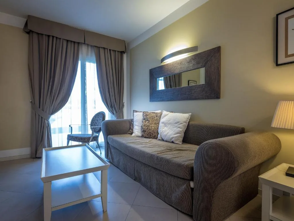 Quadruple Economy Suite — Parc Hotel Germano Suites & Apartments