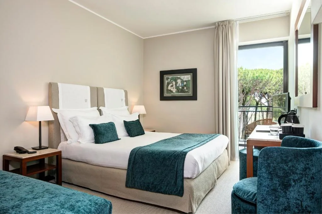 Superior Triple Room with Pinewood View Sea side — Bellevue Hotel & Resort